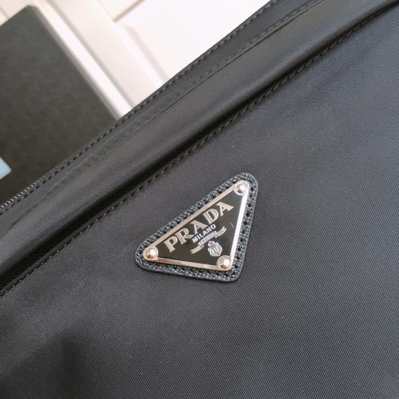 Pra*a clutch bags